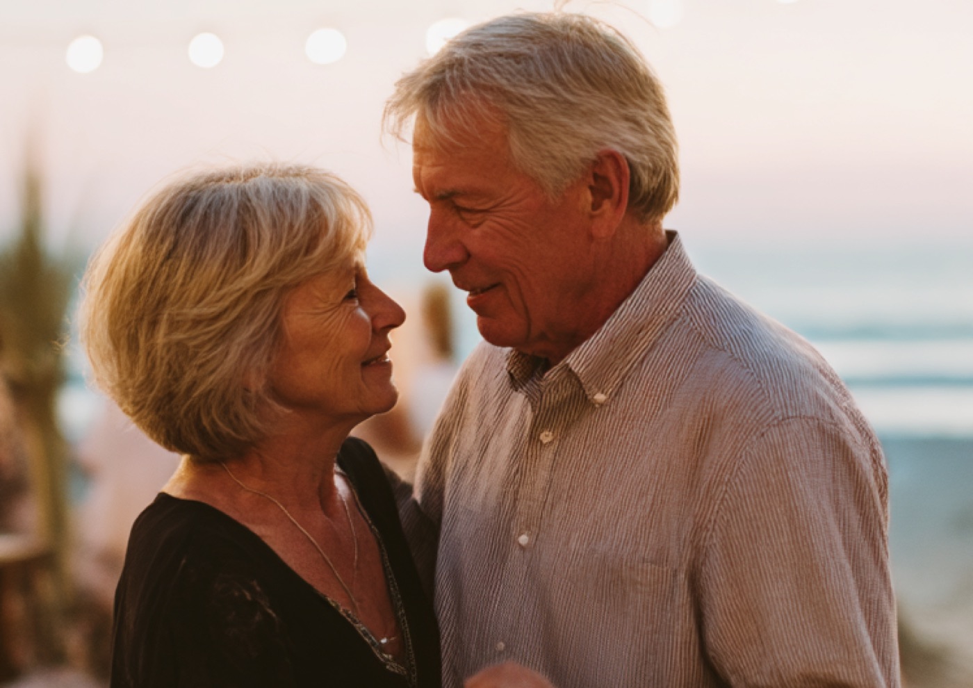 Older couple dancing close together