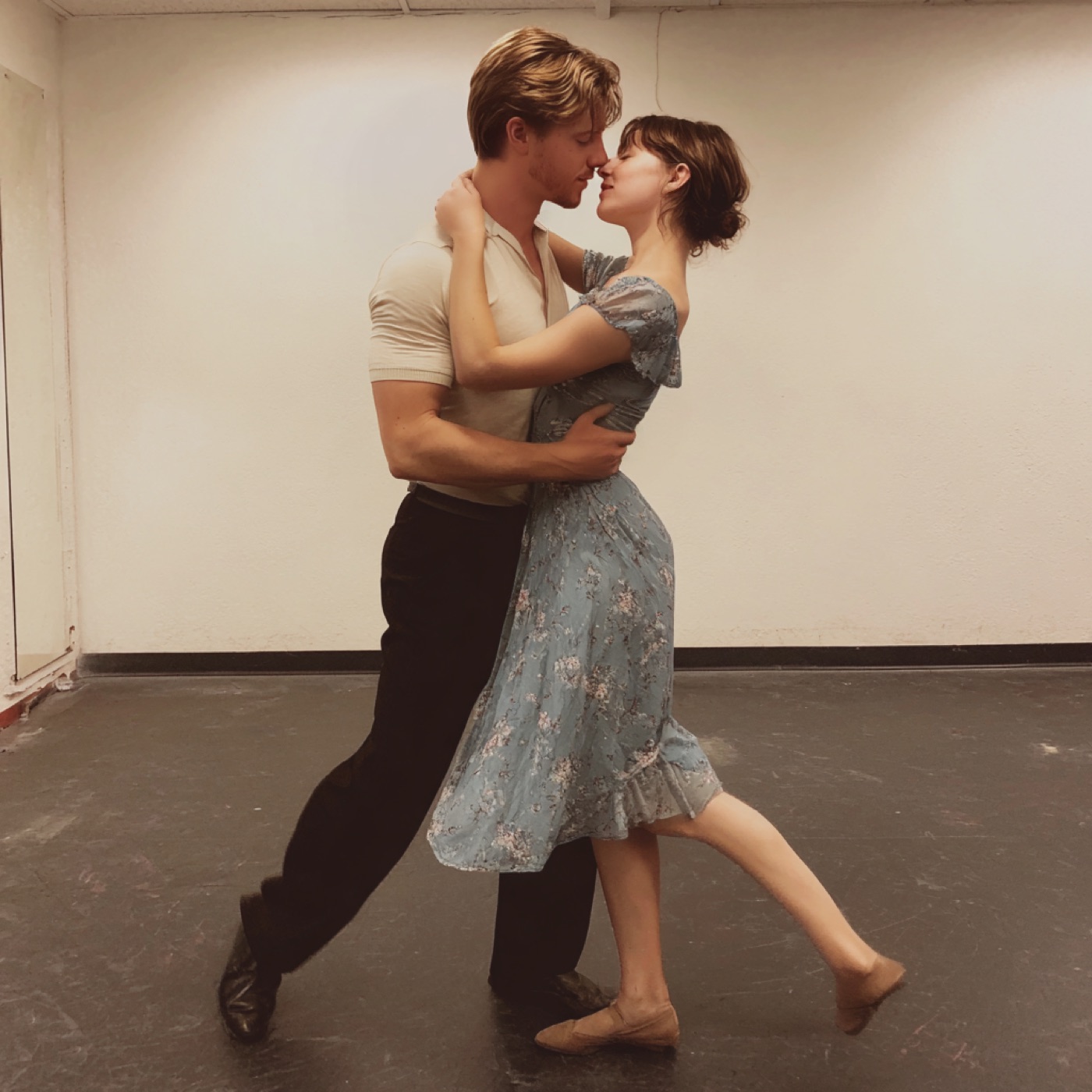 Couple dancing together in the studio